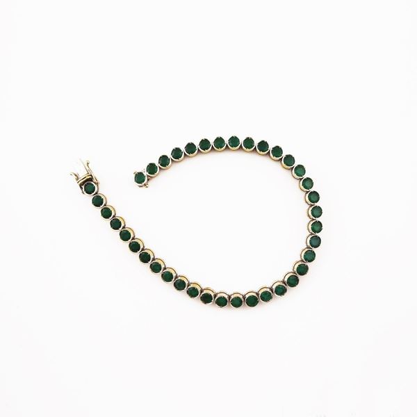 EMERALD AND GOLD BRACELET