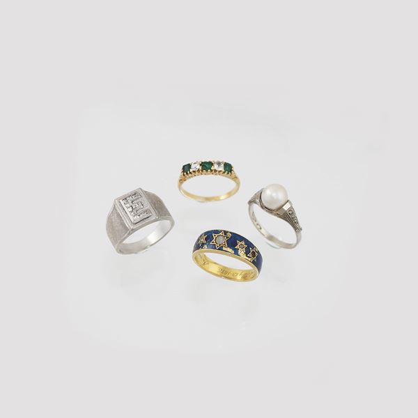 FOUR GOLD RINGS