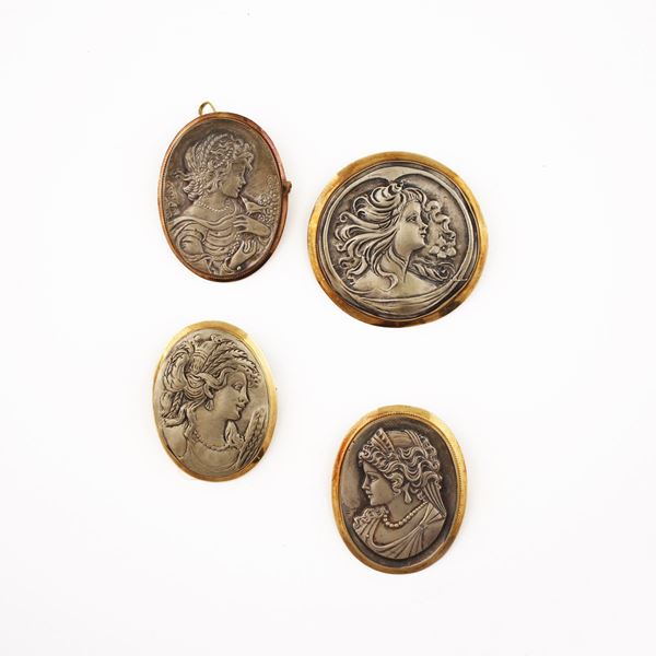 FOUR GOLD AND SILVER BROOCHES