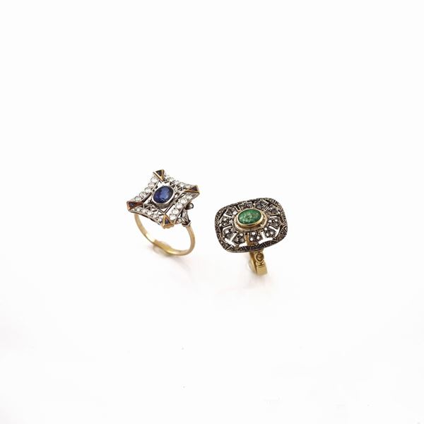 TWO DIAMOND AND GOLD RINGS WITH SAPPHIRE AND EMERALD