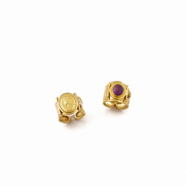 TWO AMETHYST AND GOLD RINGS