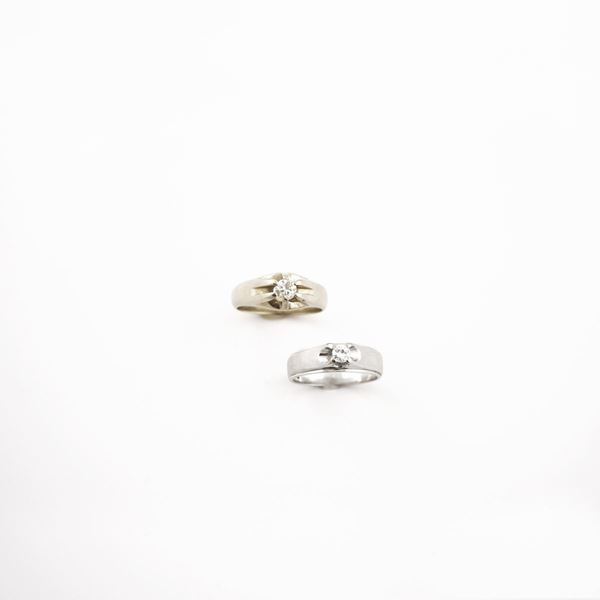 TWO DIAMOND AND GOLD RINGS