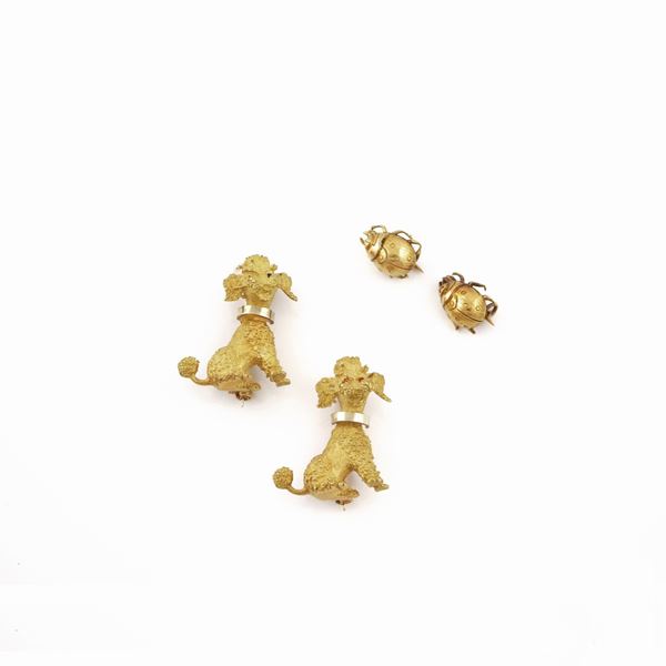 FOUR GOLD BROOCHES