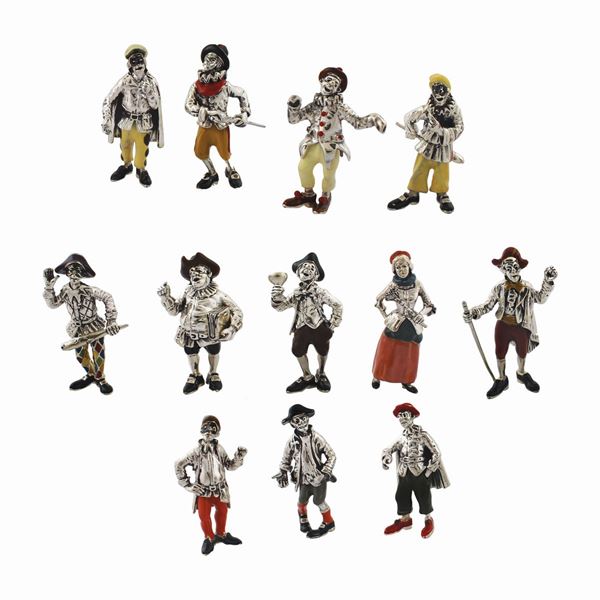 TWELVE SILVER MASKS