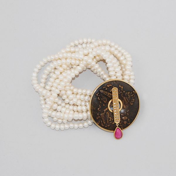 FRESHWATER PEARL BRACELET WITH BRONZE, RUBY, DIAMOND AND GOLD CLASP