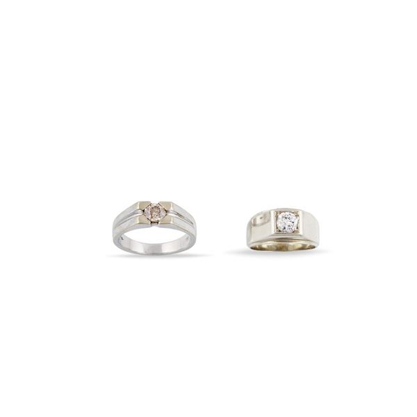 TWO DIAMOND AND GOLD RINGS