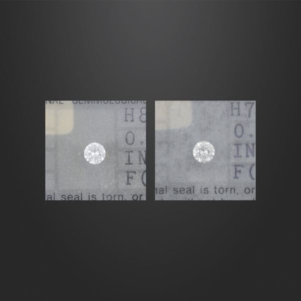TWO ROUND CUT DIAMONDS