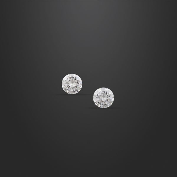 TWO ROUND CUT DIAMONDS