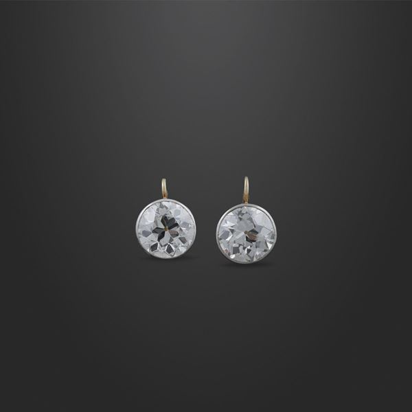 PAIR OF DIAMOND, GOLD AND SILVER EARRINGS