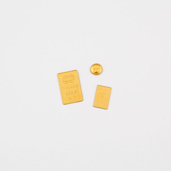 THREE GOLD INGOTS