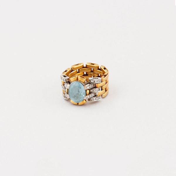 TOPAZ, DIAMOND AND GOLD RING