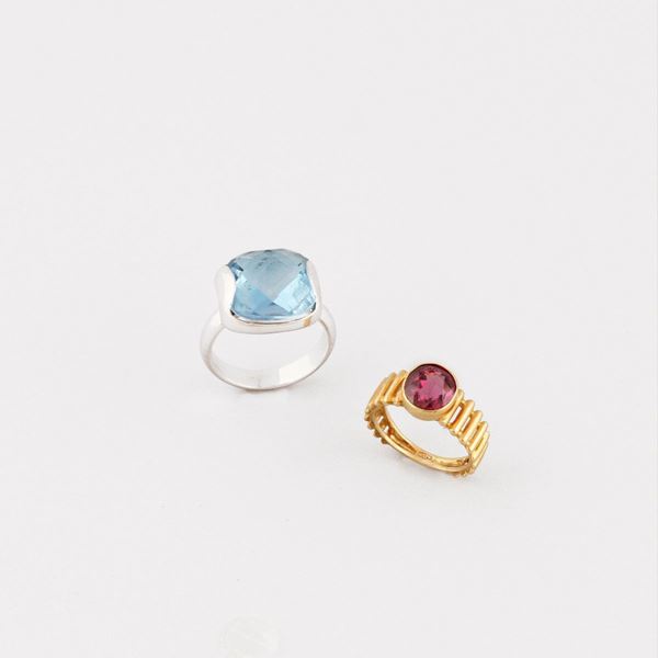 TWO TOPAZ, TOURMALINE AND GOLD RINGS