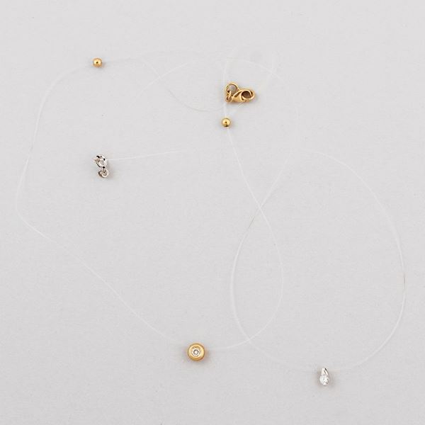 *TWO DIAMOND AND GOLD PENDANT