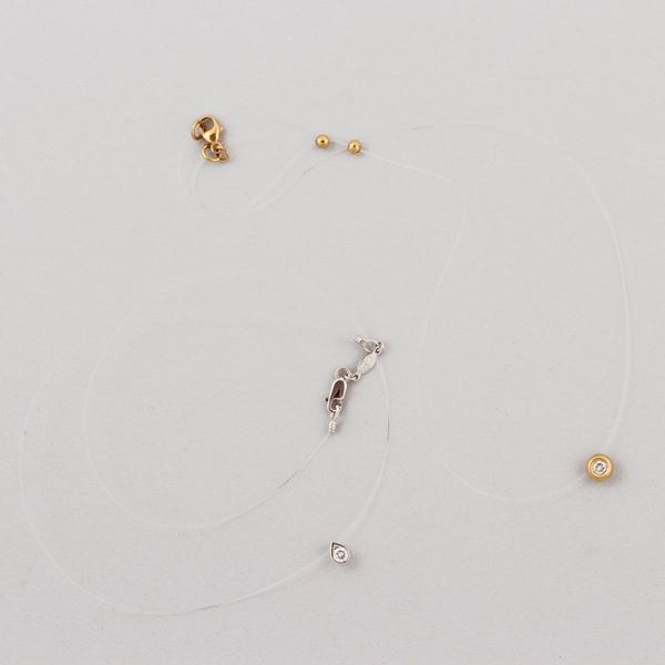 *TWO DIAMOND AND GOLD PENDANT