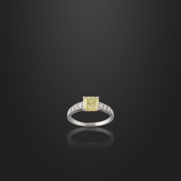 “FANCY VIVID YELLOW” DIAMOND AND PLATINUM RING
