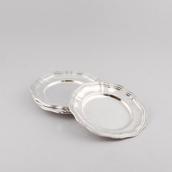 SIX SILVER BREAD DISHES