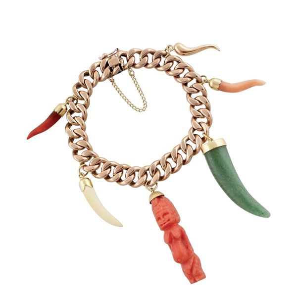 CORAL, QUARTZ, HORN AND GOLD BRACELET