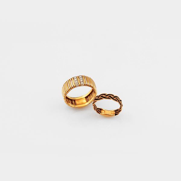 TWO DIAMOND, CAUCCIU AND GOLD RINGS