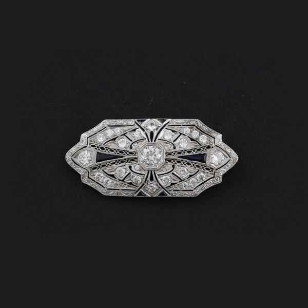 SYNTHETIC SAPPHIRE, DIAMOND AND PLATINUM BROOCH