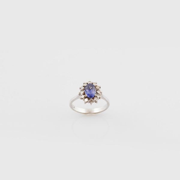 SAPPHIRE, DIAMOND AND GOLD RING