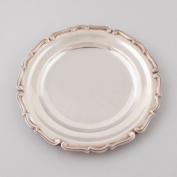 TWELVE SILVER PLATES