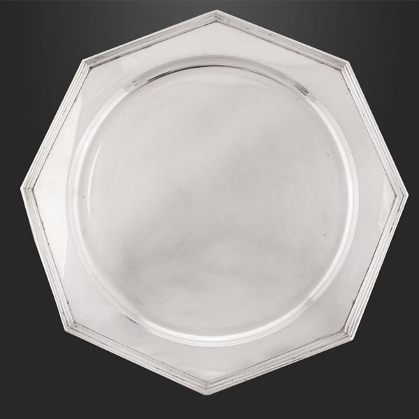 EIGHT SILVER UNDER PLATES