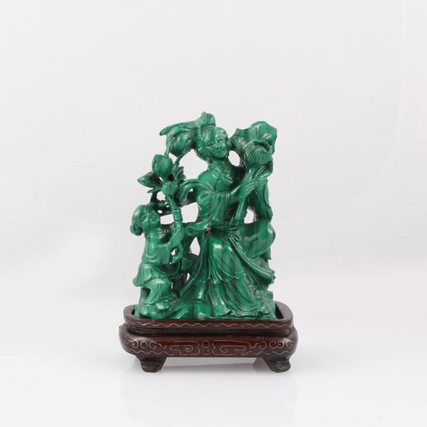 MALACHITE SCULPTURE WITH WOODEN BASE