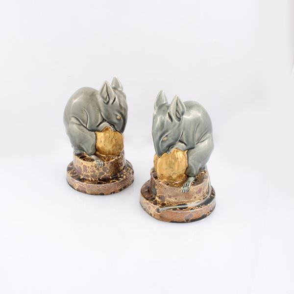TWO PORCELAIN MICE WITH WALNUT
