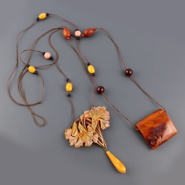 TWO BALTIC AMBER AND BAKELITE NECKLACES