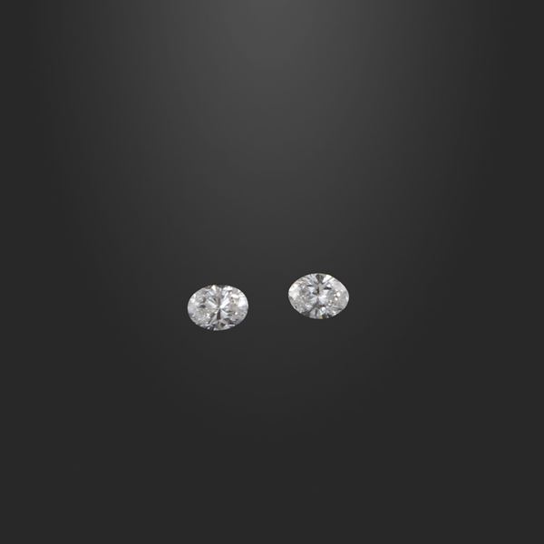TWO OVAL DIAMONDS