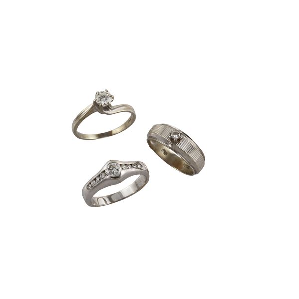 LOT OF THREE 18KT GOLD AND DIAMOND RINGS