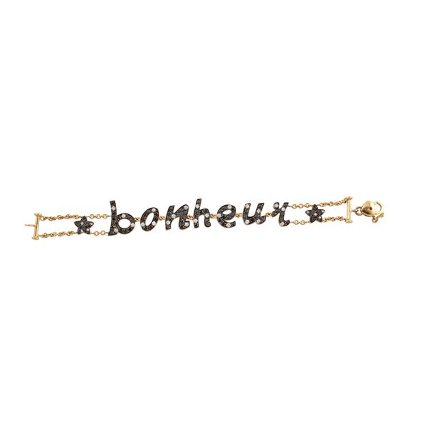 18KT GOLD, BLACK AND COLORLESS DIAMONDS "BONHEUR" BRACELET, CRIVELLI