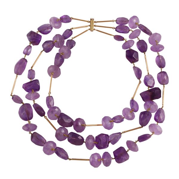 18KT GOLD AND AMETHYSTS THREE STRAND NECKLACE
