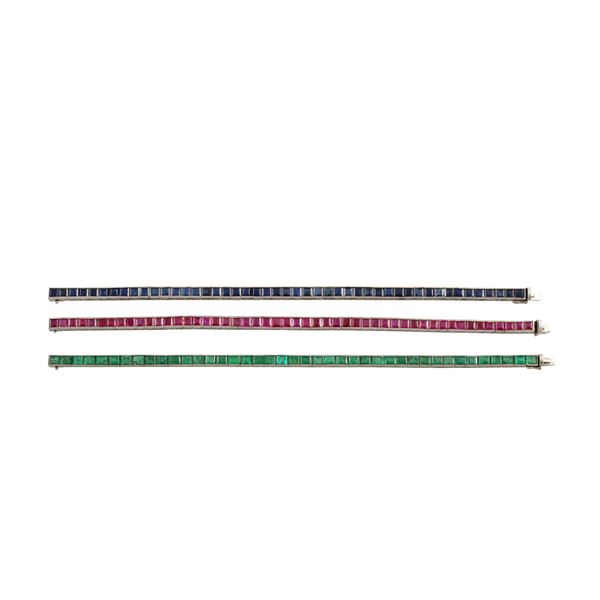 LOT OF THREE 18KT GOLD, RUBIES, SAPPHIRES AND EMERALDS BRACELETS