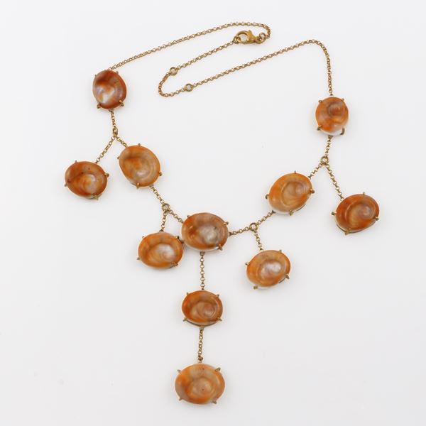 * 18KT GOLD NECKLACE WITH "EYES OF SAINT LUCIA" SHELL OPERLCULA
