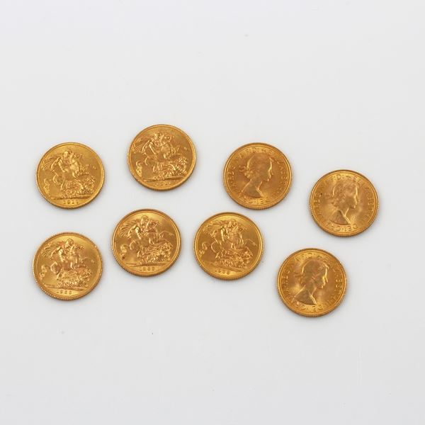 LOT OF EIGHT GOLD POUND COINS