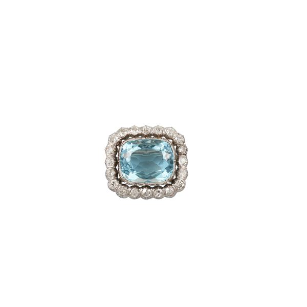 18KT GOLD, ACQUAMARINE AND DIAMONDS BROOCH