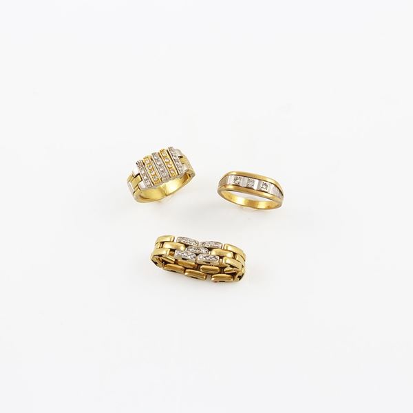 LOT OF THREE RINGS. 18KT GOLD AND SINGLE-CUT DIAMONDS