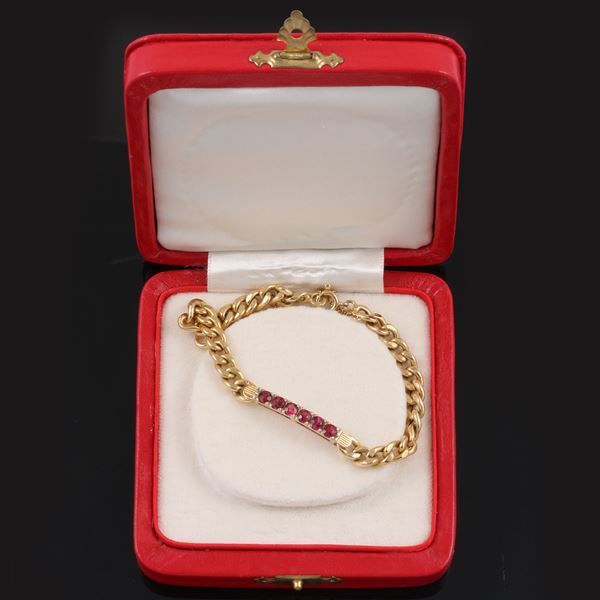 18KT GOLD AND RED TURMALINES BRACELET