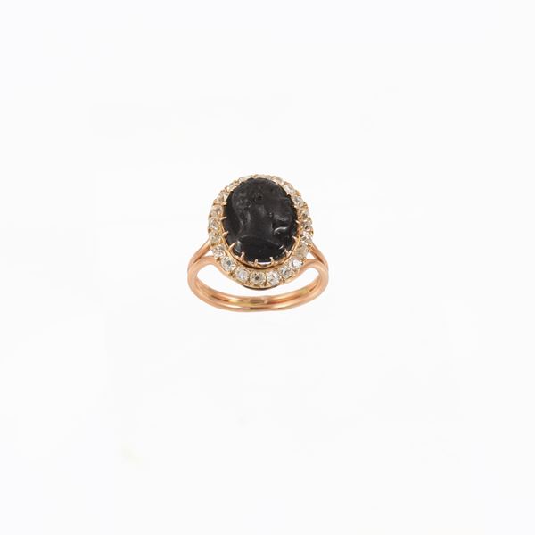 18KT GOLD, ONYX AND OLD MINE CUT DIAMONDS (chipped) RING