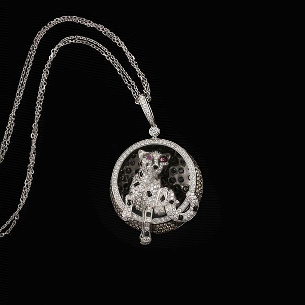 18KT GOLD, COLORLESS, BROWN AND BLACK DIAMONDS, RUBIES AND ONYX "PANTHER" PENDANT WITH CHAIN