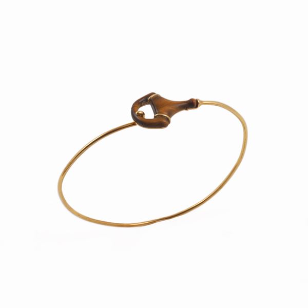 18KT GOLD AND TIGER EYE (fêlure) BANGLE, GUCCI