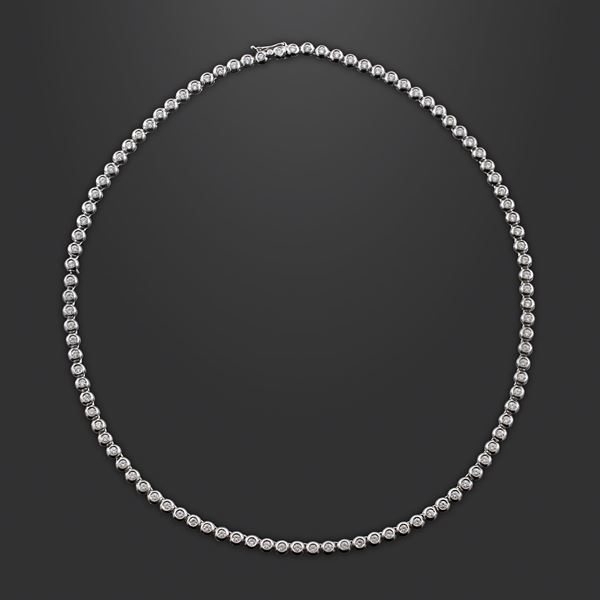 18KT GOLD AND DIAMOND NECKLACE, DAMIANI