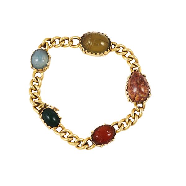 18KT GOLD BRACELET WITH HARDSTONE SCARABS