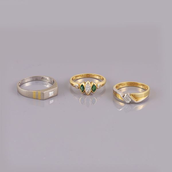 18KT GOLD AND PLATINUM LOT OF TRHEE RINGS WITH DIAMONDS AND EMERALDS