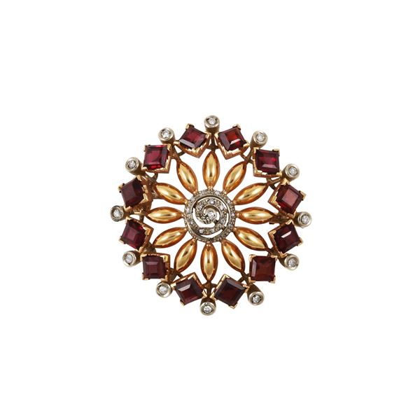 18KT GOLD, GARNETS AND DIAMONDS (two missings) BROOCH