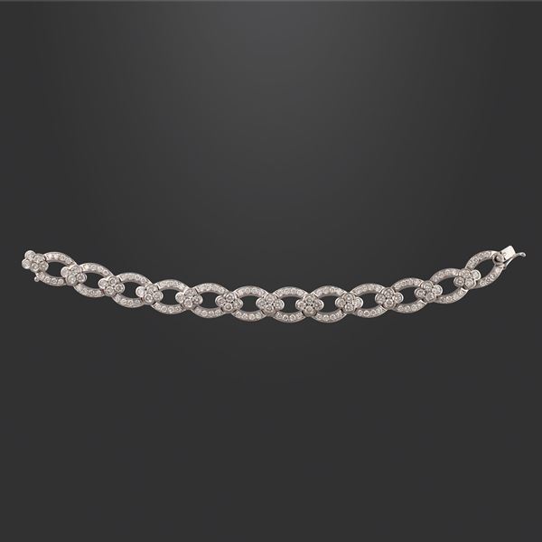 * 18KT GOLD AND DIAMONDS BRACELET