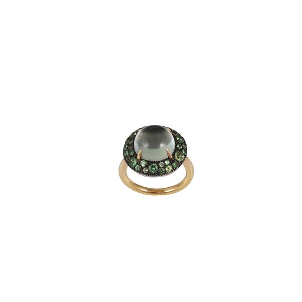 * 18KT GOLD, 925 SILVER, PERIDOT AND CABOCHON CUT QUARTZ RING