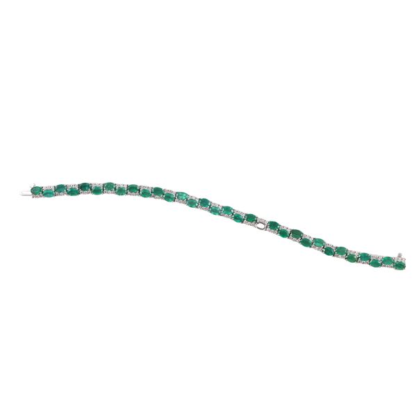 18KT GOLD, EMERALDS (one missing) AND DIAMONDS BRACELET