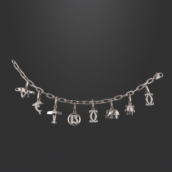 BRACCIALE CON CHARMS, CARTIER  - Asta GIOIELLI IMPORTANTI - Casa d'Aste International Art Sale